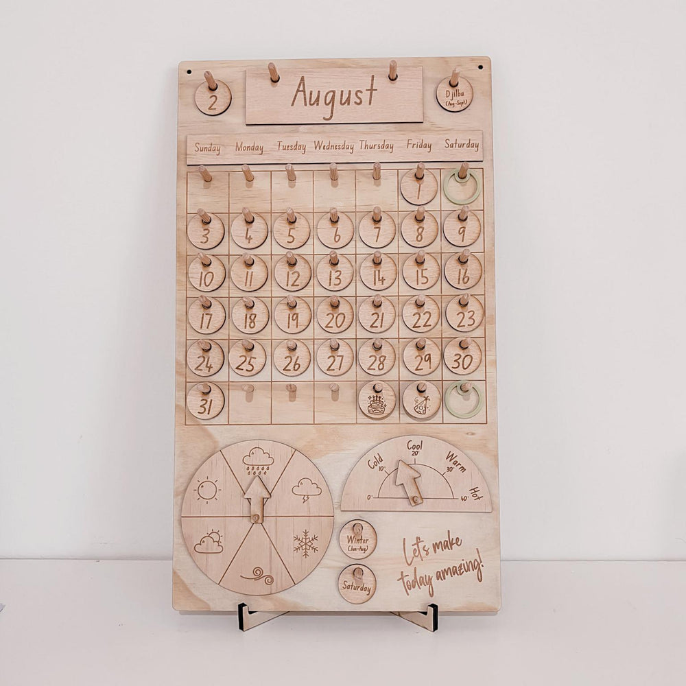 Montessori-inspired classroom calendar with wooden discs for days, months, seasons, weather incl. six Nyoongar seasons.