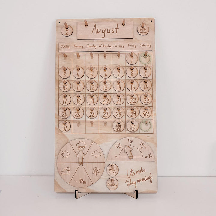 Montessori-inspired classroom calendar with wooden discs for days, months, seasons, weather incl. six Nyoongar seasons.
