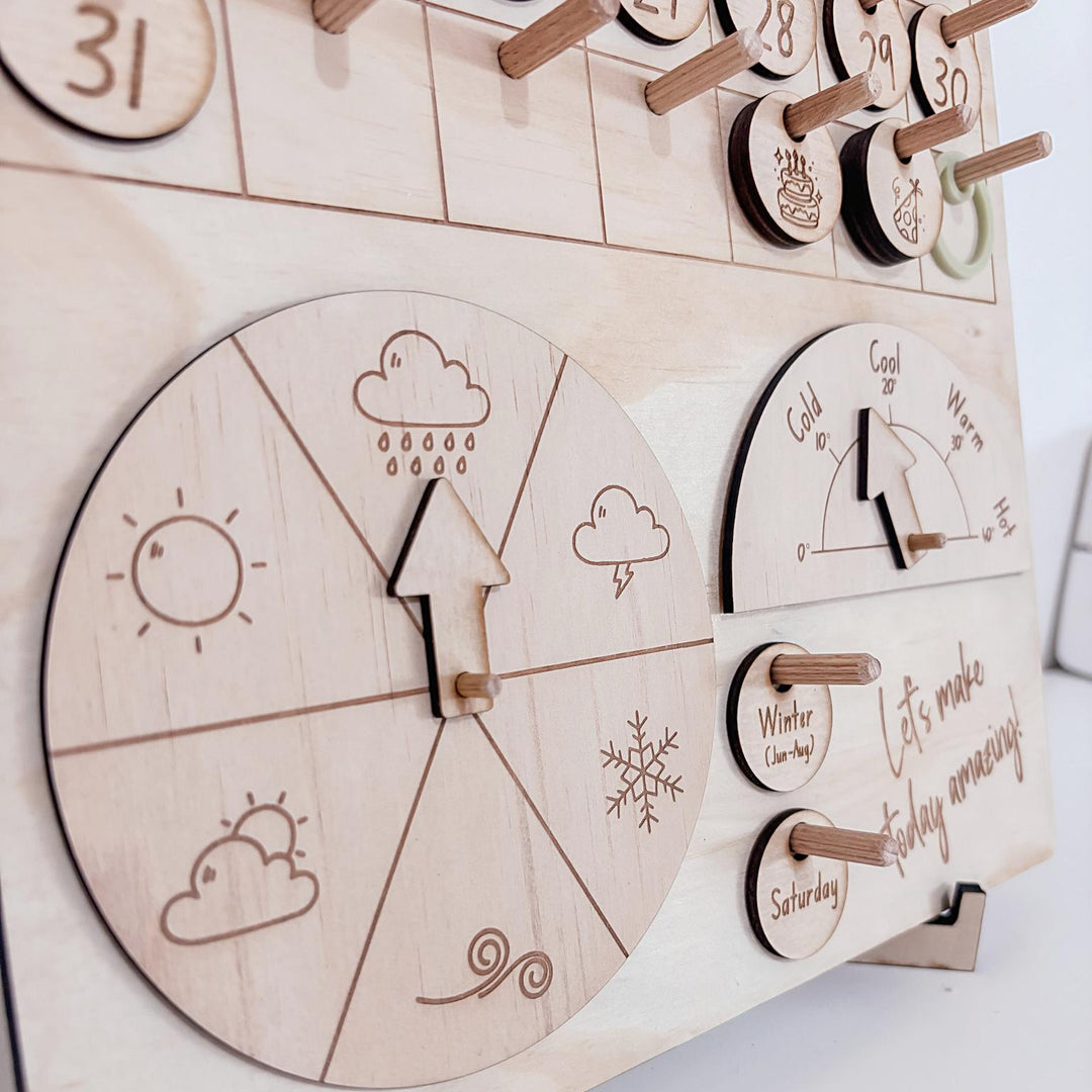 Montessori-inspired classroom calendar with wooden discs for days, months, seasons, weather incl. six Nyoongar seasons.