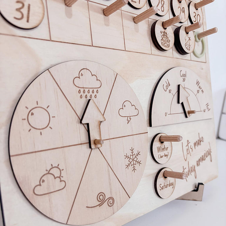 Montessori-inspired classroom calendar with wooden discs for days, months, seasons, weather incl. six Nyoongar seasons.