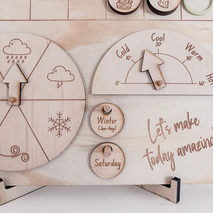 Montessori-inspired classroom calendar with wooden discs for days, months, seasons, weather incl. six Nyoongar seasons.
