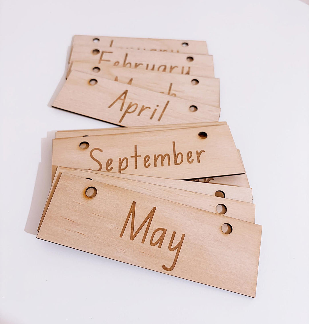 Montessori-inspired classroom calendar with wooden discs for days, months, seasons, weather incl. six Nyoongar seasons.