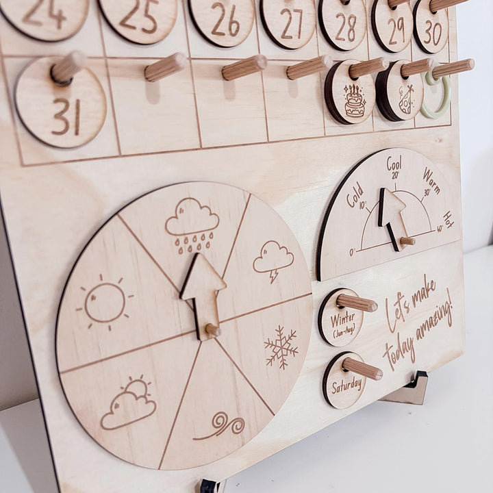 Montessori-inspired classroom calendar with wooden discs for days, months, seasons, weather incl. six Nyoongar seasons.