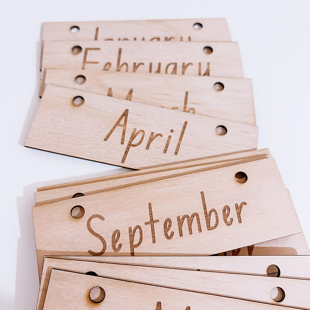 Montessori-inspired classroom calendar with wooden discs for days, months, seasons, weather incl. six Nyoongar seasons.
